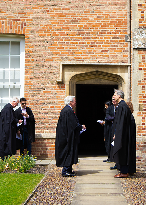 Fellows and Master preparing to enter the Chapel ahead of the Admission of Fellows ceremony. 