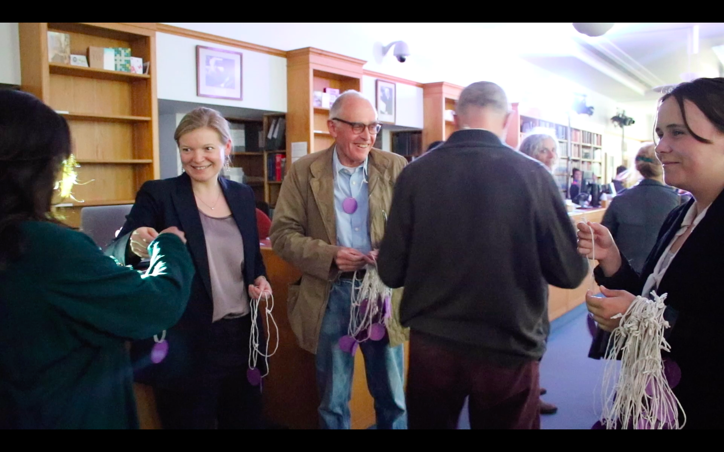 Figure 5: Visitors entering the Rare Books Reading Room where they receive a ‘sensor’ prompting them to decide whether they are human or puppet at their departure (The Great Wurstel, Cambridge University Library, 2019). Watch the trailer for the film version here which will be launched at the end of this performance (picture by Matthew Harris). 