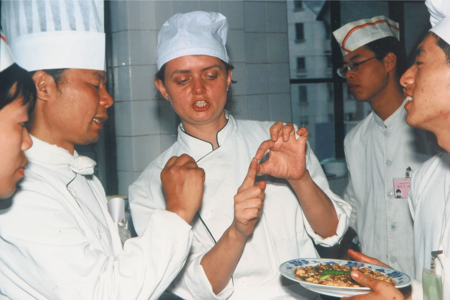 Ms Fuchia Dunlop - vintage shot of Fuchsia at cooking school in China - Image Credit Lai Wu